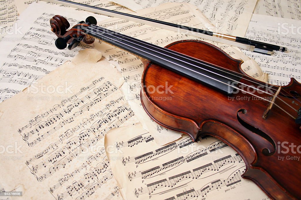Violin with bow and music sheet Violin with bow and music sheet